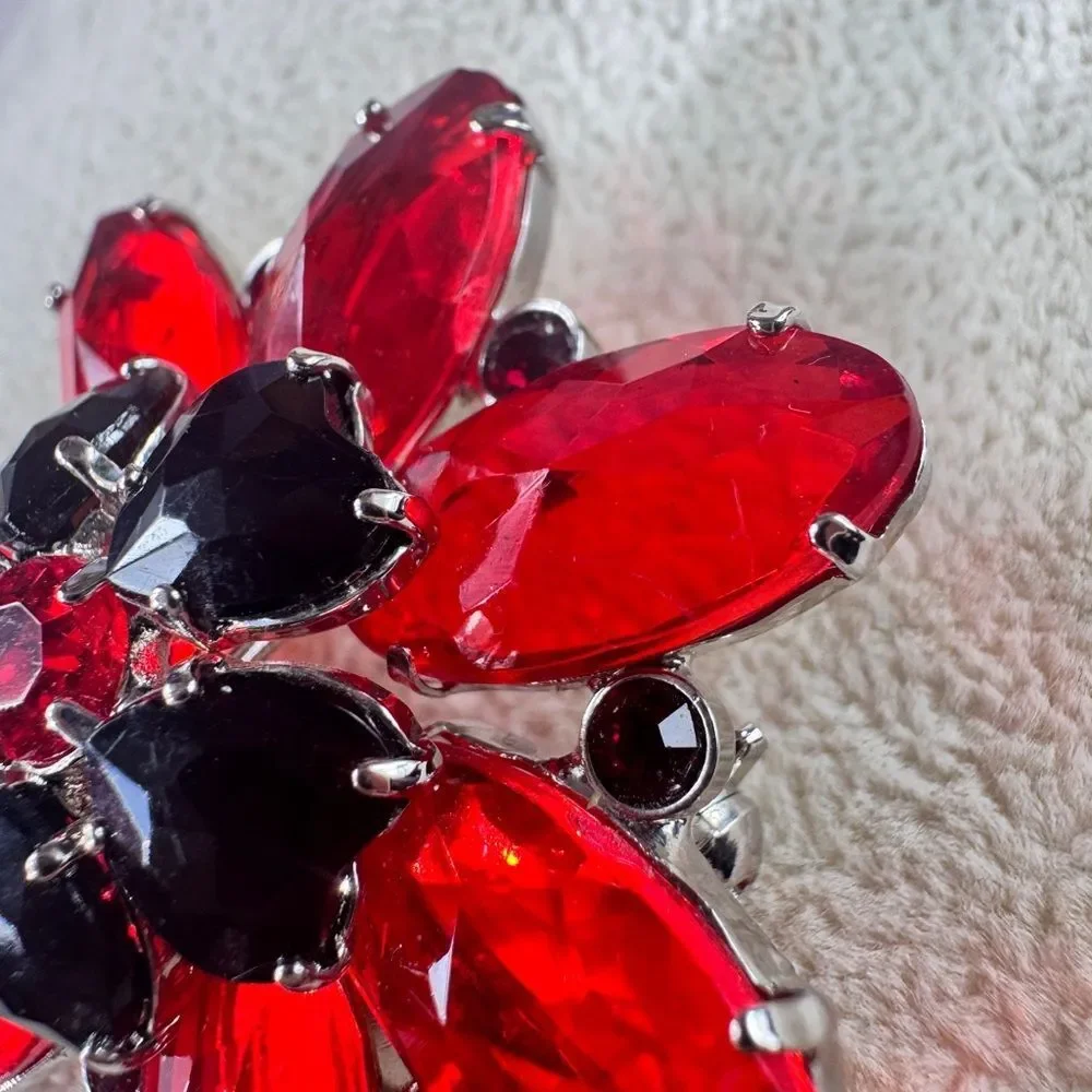 Elegant Red and Black Floral Brooch